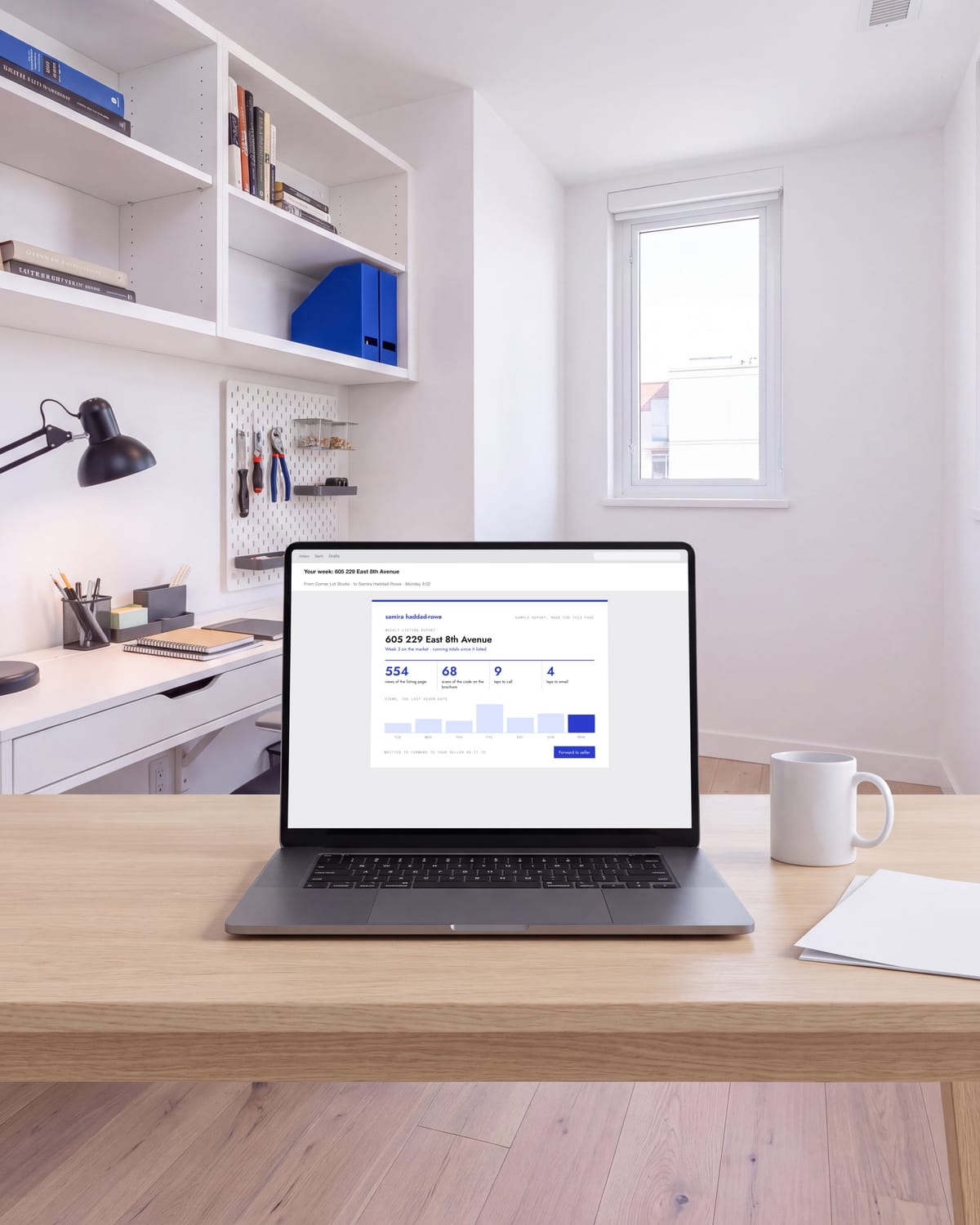 A laptop showing a sample agent's weekly listing report