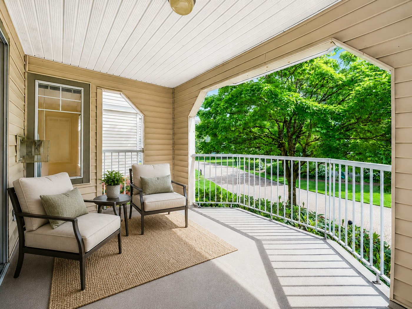 Covered balcony with staged seating, brochure cover photograph